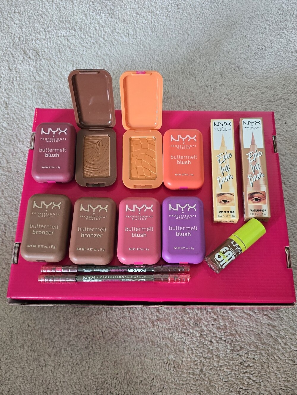 NYX makeup set:buttermelt bronzer & blush, eyebrow pencils, eyeliner & lip oil